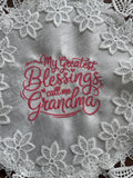 'My Greatest Blessings Call Me Grandma' machine embroidered 16" white doily